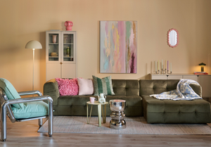 Shop de woonkamerlook: Groene bank, verfijnde balans