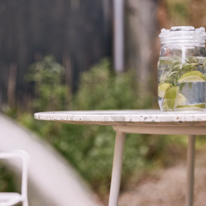 Tikamoon - Ronde tuintafel in premium terrazzo en groen metaal 4 p.