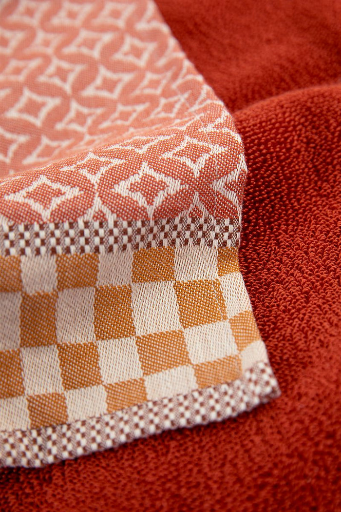 Sissy-Boy Donkeroranje handdoek en theedoek