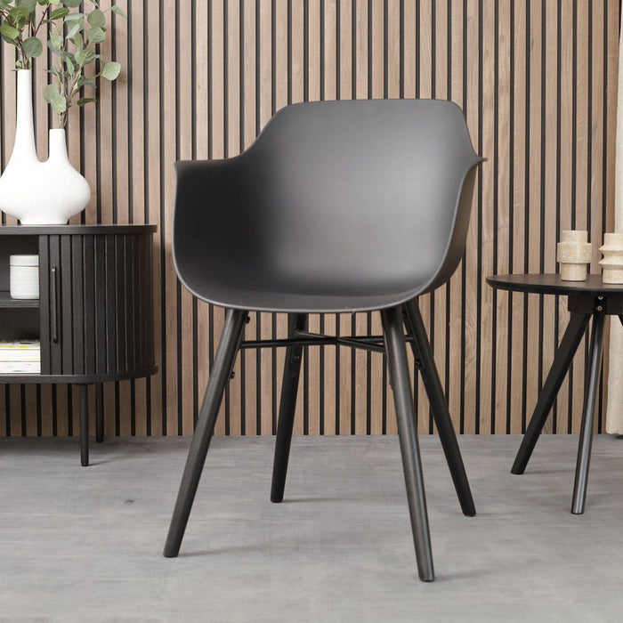 Nolon Nena-Puk Eetkamerstoel Zwart - Armleuning - Zwarte Houten Poten