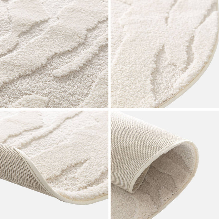 sweeek - Binnentapijt in kiezelvorm met crèmekleurig reliëfpatroon