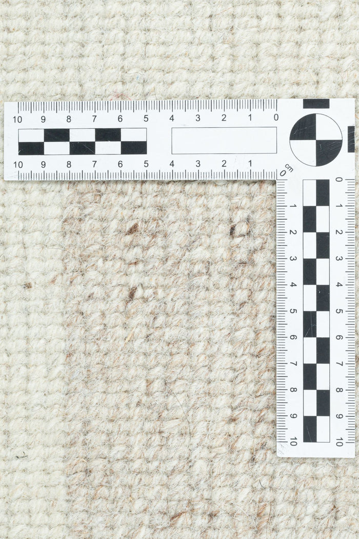 Theko Handgeknoopt wollen tapijt Nakarta 90x160 cm - Beige