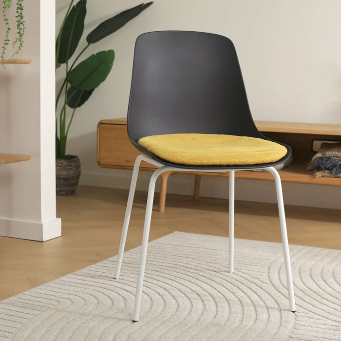 Nolon Nora-Liv Eetkamerstoel Zwart - Okergeel Kussen - Witte Poten