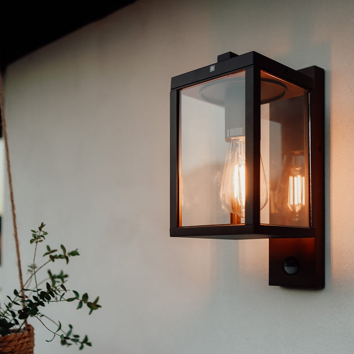 QAZQA Buiten wandlantaarn roestbruin met bewegingssensor IP44 -