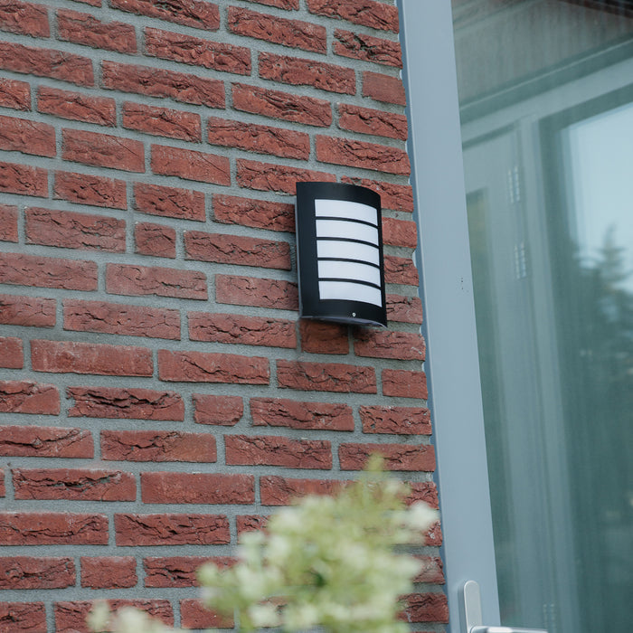 QAZQA Buiten wandlamp zwart IP44 met schemersensor - Miro