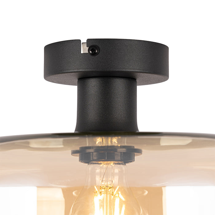 QAZQA Art deco plafondlamp zwart met amber glas - Bizle