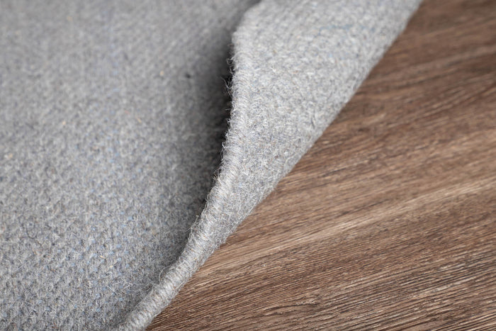 Hioshop Jaipur vloerkleed Ø200 cm wol lichtgrijs.