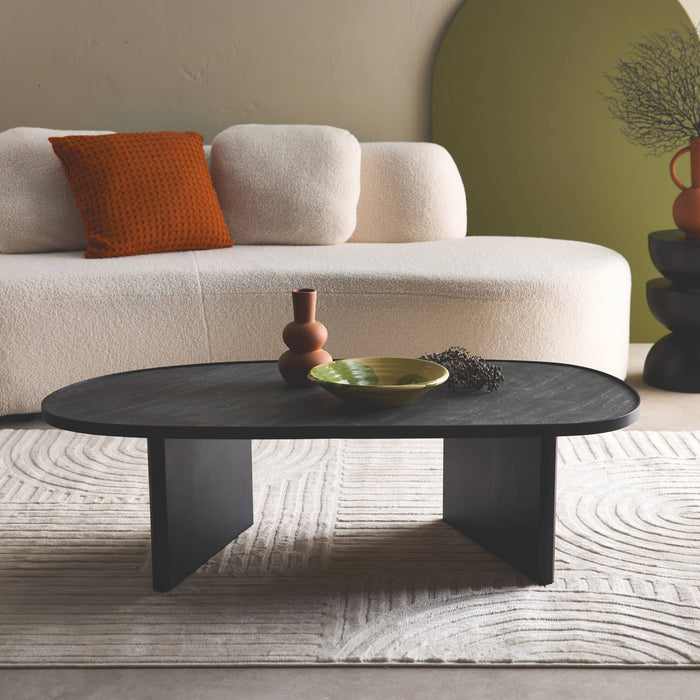 sweeek - Ovale salontafel mangohout en steenfineer