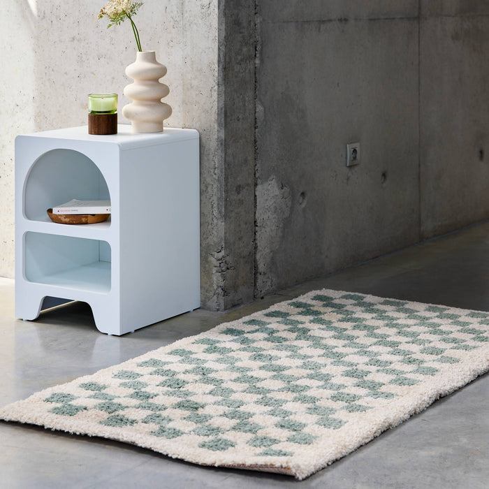 sweeek - Lichtblauw en crèmekleurig geruit interieur tapijt