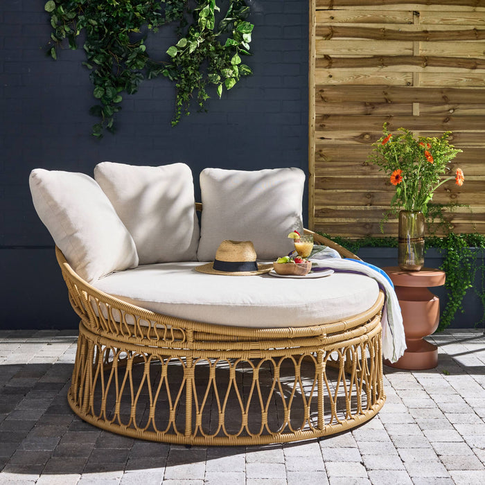 sweeek - Ronde loungebank in staal en imitatie rotan