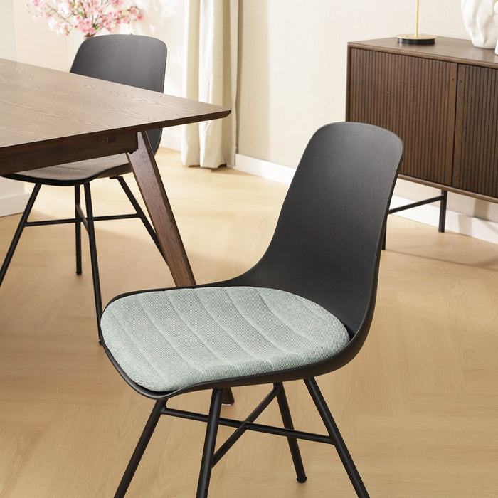 Nolon Noa-Liv Eetkamerstoel Zwart - Zacht Groen Kussen - Zwarte Poten