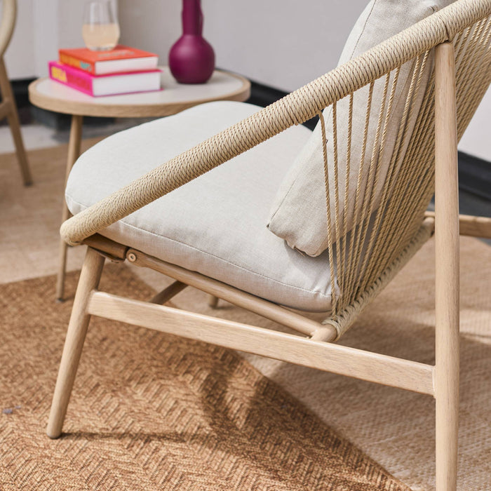 sweeek - Set van 2 tuinstoelen met stalen en rotan tafel