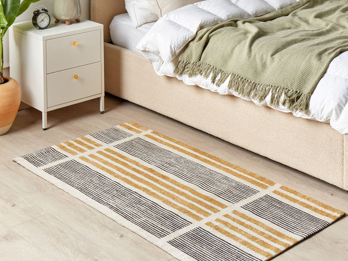 Beliani - KATRA - Laagpolig vloerkleed - Geel - 80 x 150 cm - Katoen