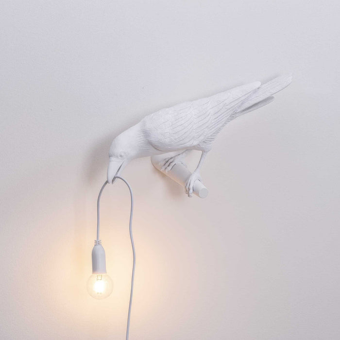 Bird Looking wandlamp links buiten wit