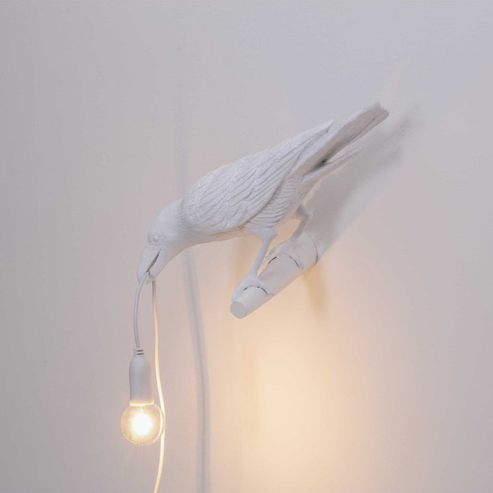 Bird Looking wandlamp links buiten wit