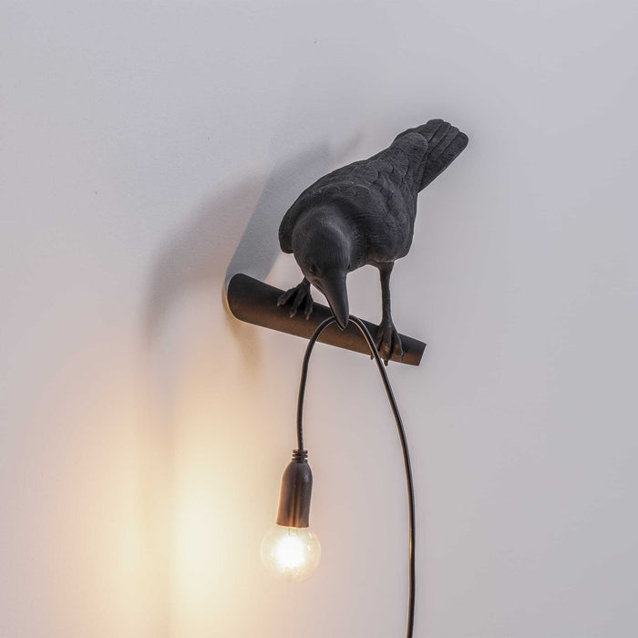 Bird Looking wandlamp links buiten wit