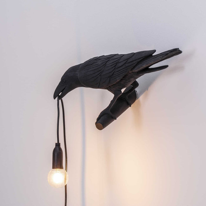 Bird Looking wandlamp links buiten wit