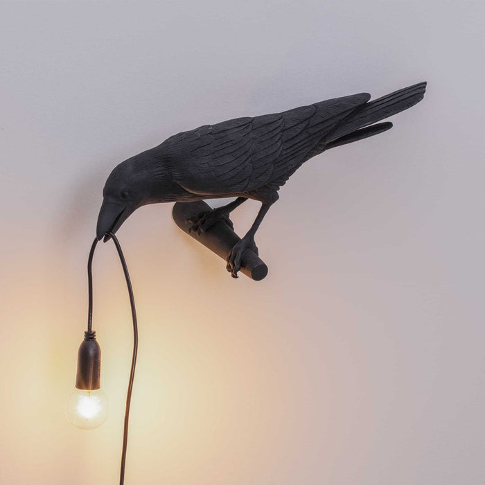 Bird Looking wandlamp links buiten wit