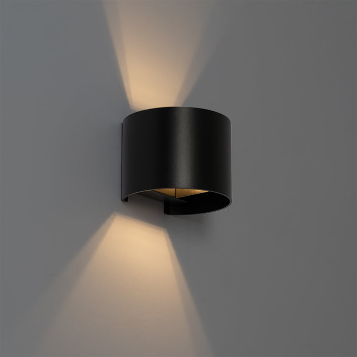 QAZQA Moderne wandlamp zwart met lichteffect rond - Edwin