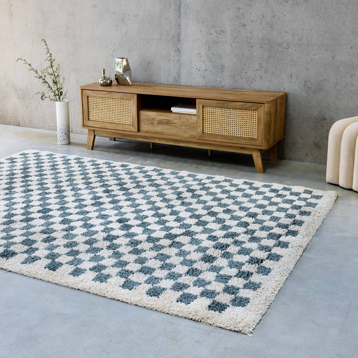 sweeek - Donkerblauw en crèmekleurig dambord vormig interieur tapijt