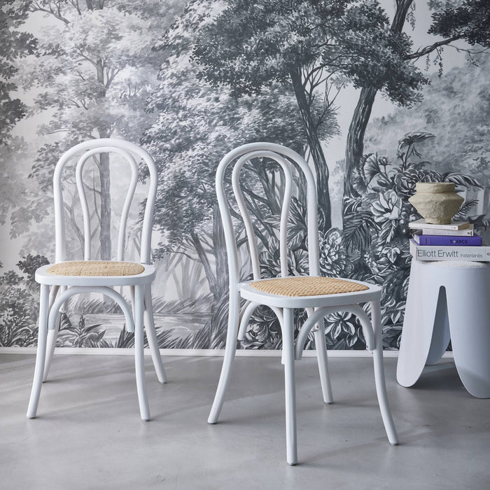 sweeek - Vintage rubberhouten en rotan stoelen (set van 2)