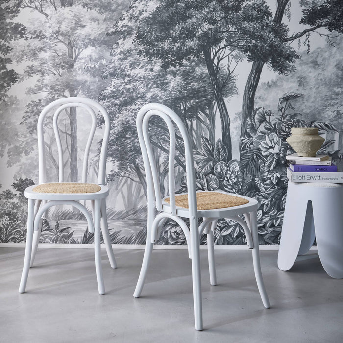 sweeek - Vintage rubberhouten en rotan stoelen (set van 2)